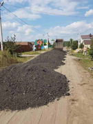 В Железнодорожном районе продолжается работа по выравниванию улиц частного сектора срезом асфальтобетона